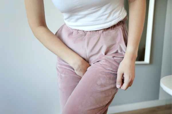 woman running for the toilet because of urinary incontinence Willenhall